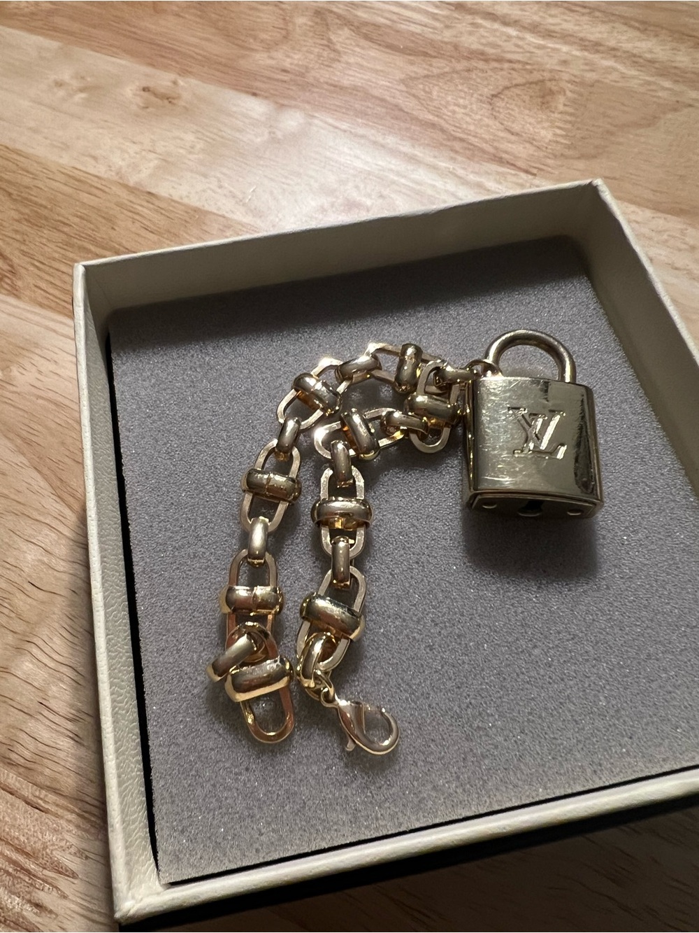 Louis Vuitton Gold Chain Bracelet with Padlock Charm